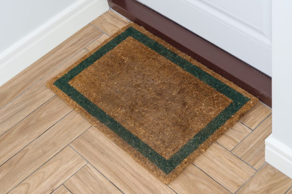 Brown natural rug with green contour